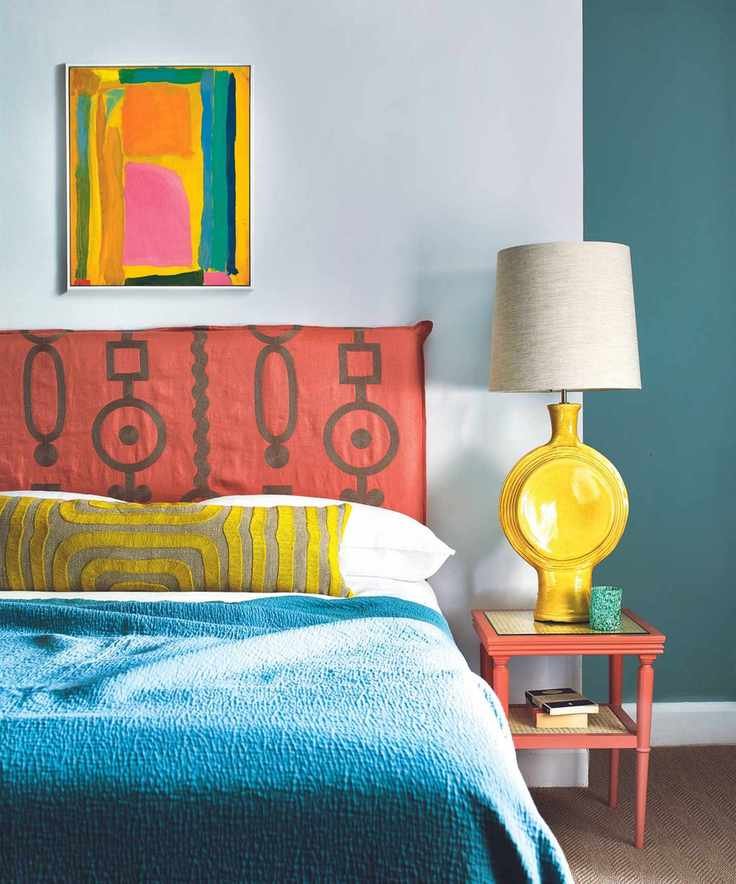 Colorful bedroom with fabric headboard