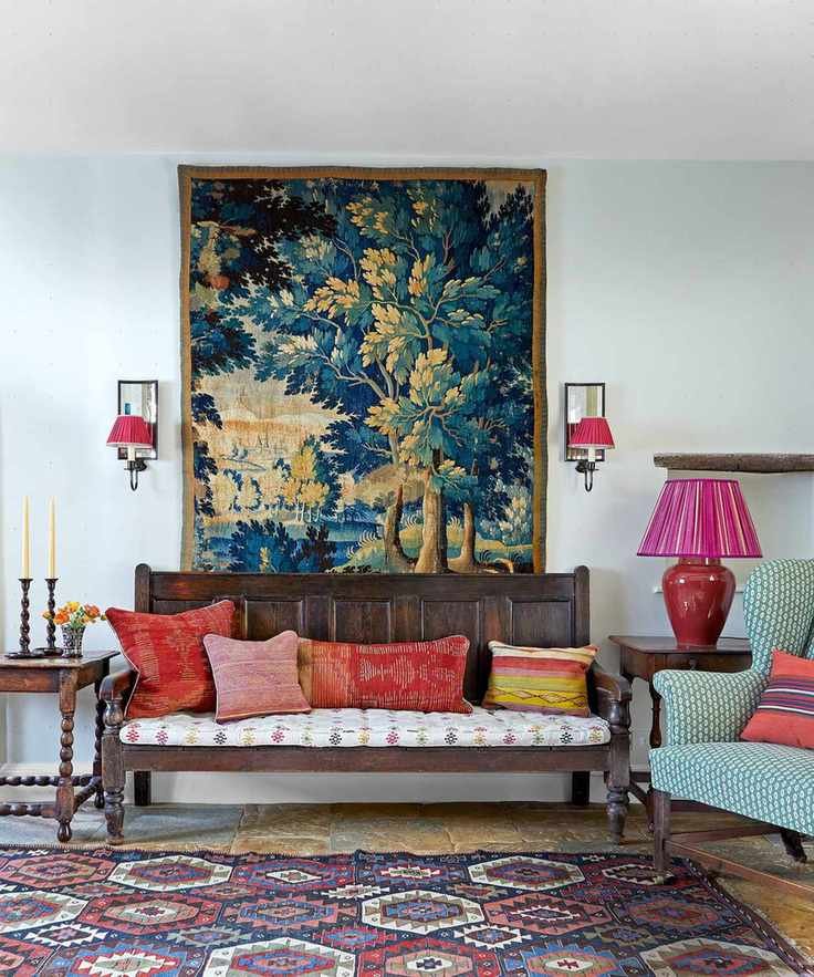 colorful hall with Verdure tapestry, antique kilim and wooden bench